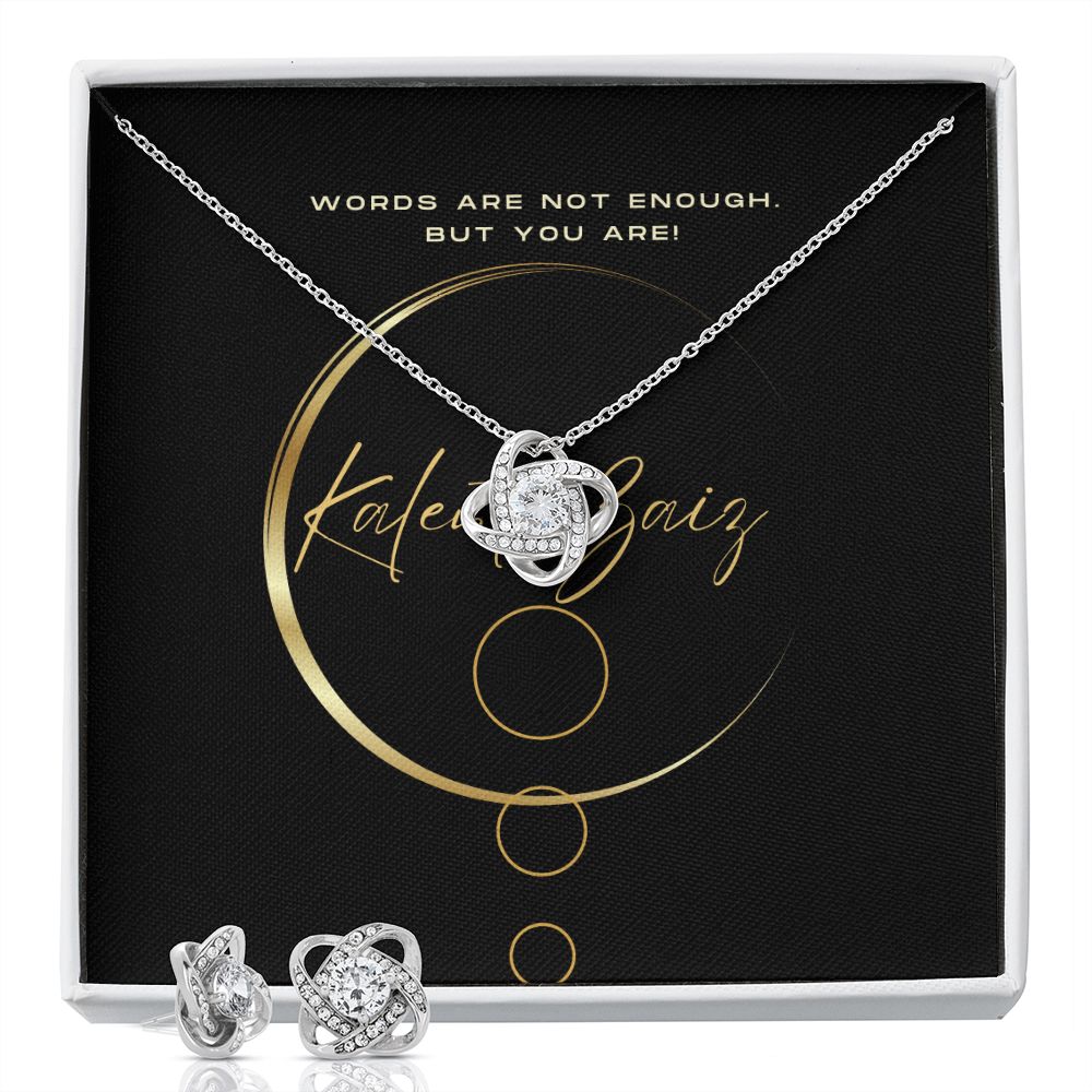 Love Knot Pendant and Earrings Set Surprise your loved one with this gorgeous Love Knot Earring & Necklace Set! The Love Knot design represents an unbreakable bond between two souls. This symbol of never-ending love is a forever favorite and trending everywhere.
