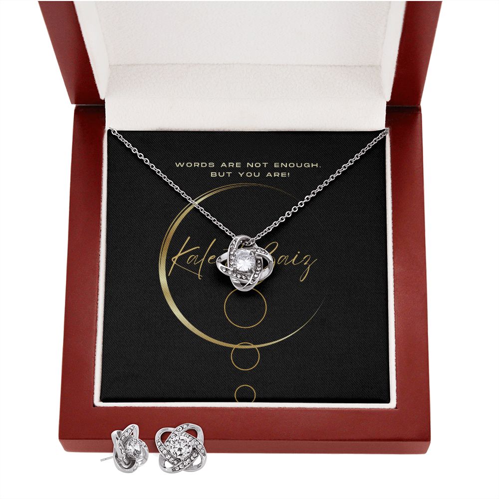 Love Knot Pendant and Earrings Set Surprise your loved one with this gorgeous Love Knot Earring & Necklace Set! The Love Knot design represents an unbreakable bond between two souls. This symbol of never-ending love is a forever favorite and trending everywhere.