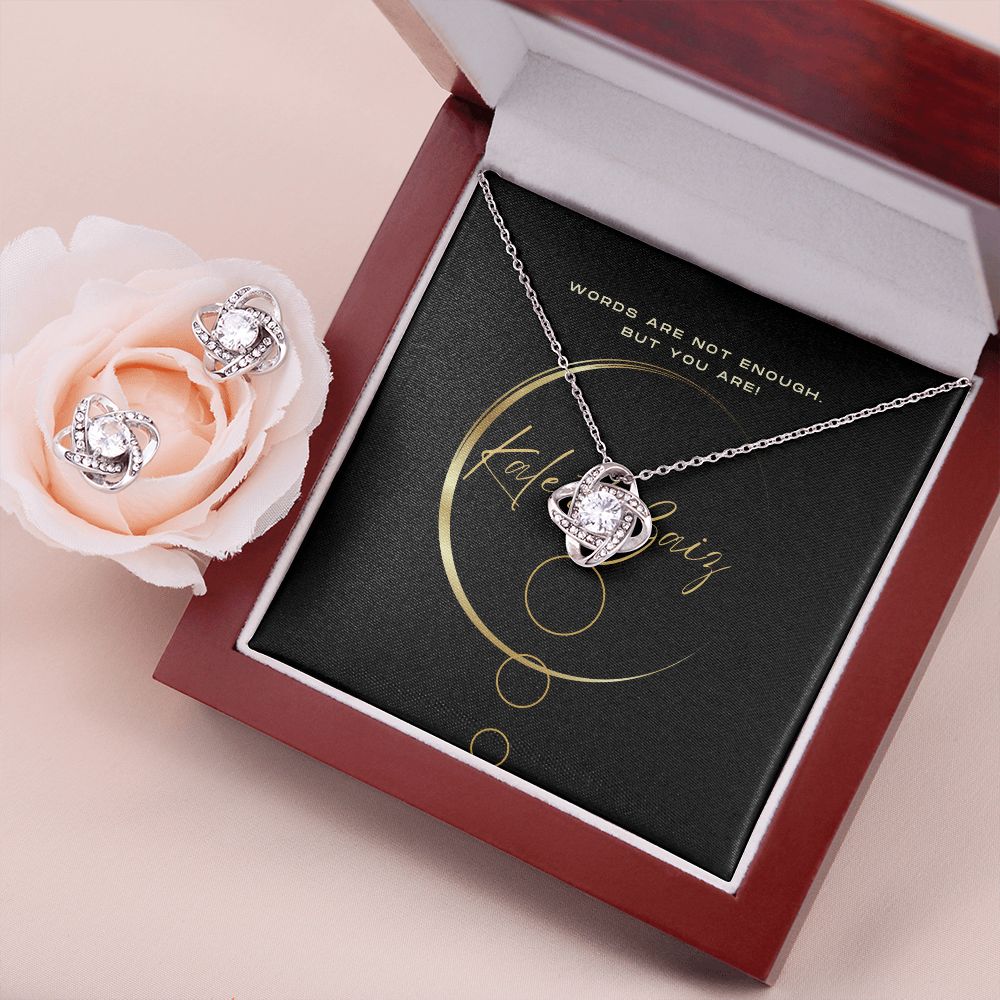 Love Knot Pendant and Earrings Set Surprise your loved one with this gorgeous Love Knot Earring & Necklace Set! The Love Knot design represents an unbreakable bond between two souls. This symbol of never-ending love is a forever favorite and trending everywhere.