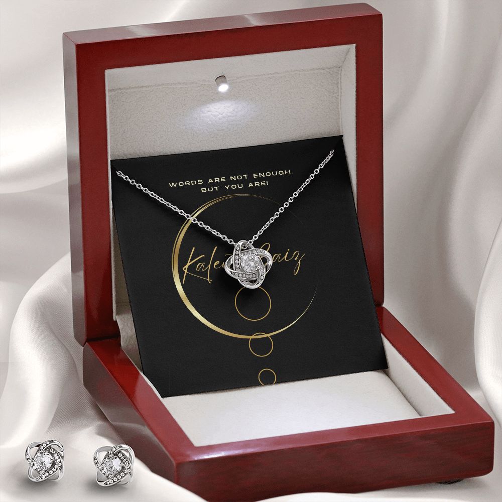 Love Knot Pendant and Earrings Set Surprise your loved one with this gorgeous Love Knot Earring & Necklace Set! The Love Knot design represents an unbreakable bond between two souls. This symbol of never-ending love is a forever favorite and trending everywhere.