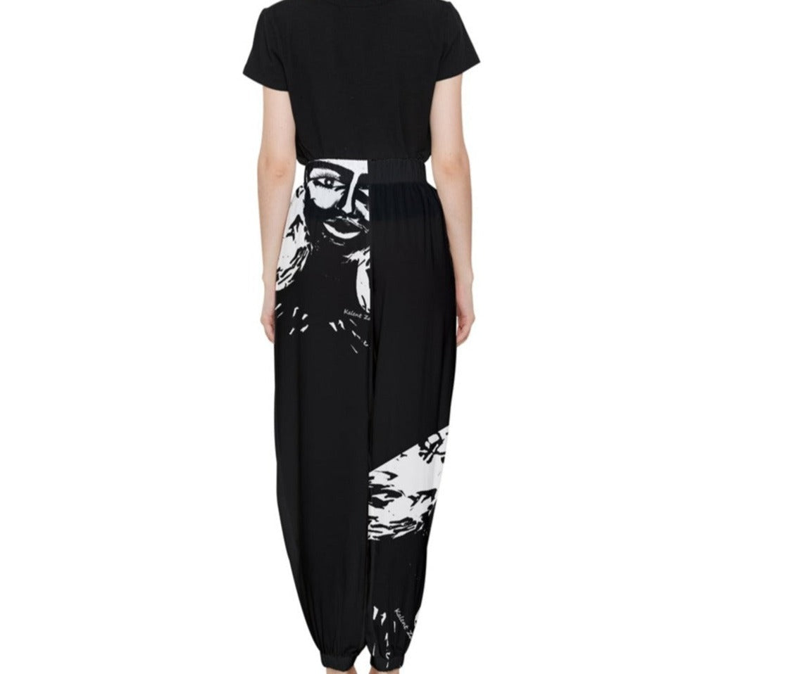 One of this season's statement pieces is the Monochrome Frida Leg Pants a modern of classic trousers, inspired in Frida Kahlo Made from a lightweight recycled nylon weave season's soft Seapray shade, the wide, high-waisted silhouette features allow you to style it with a plain leotard, or a classic shirt as your choose. Product Details Recycled Nylon Fabrication Main: 100% Recycled Nylon do not dry clean