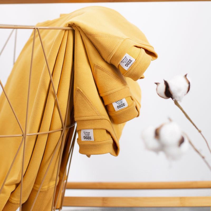 Egg yellow 320G solid round neck couple's top men's long sleeve sweater