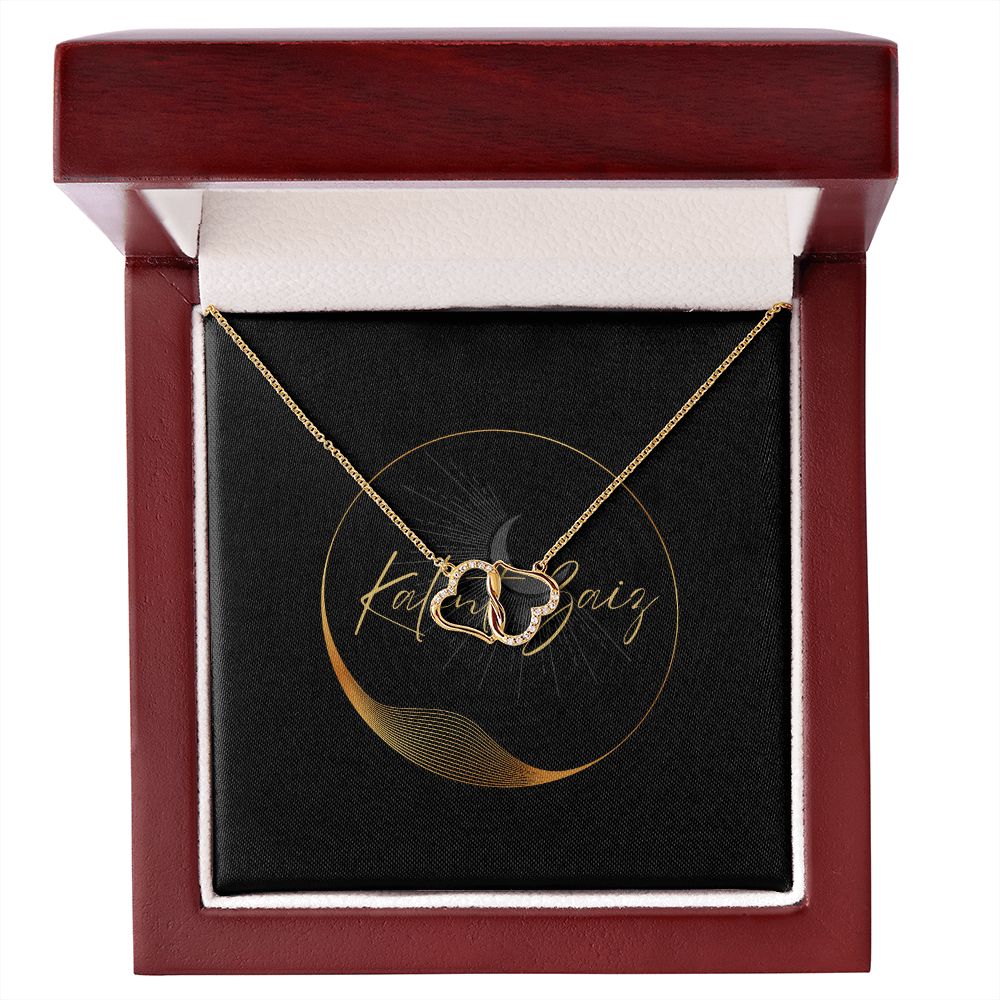 10K Yellow Gold Hearts Necklet A stunning, infinitely connected pair of 10K solid yellow gold hearts that perfectly symbolizes your Everlasting Love. Each heart is intricately accented with 18 pave set diamonds with a 0.07-carat weight, adding magnificent sparkle.
