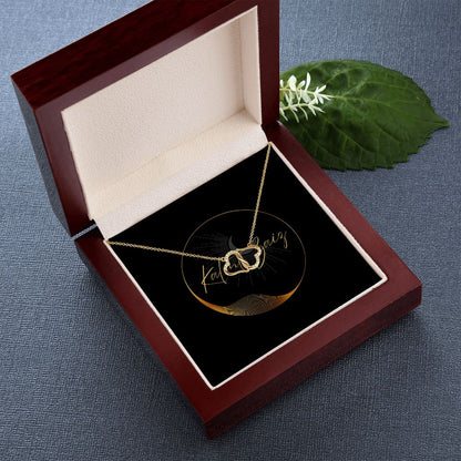 10K Yellow Gold Hearts Necklet A stunning, infinitely connected pair of 10K solid yellow gold hearts that perfectly symbolizes your Everlasting Love. Each heart is intricately accented with 18 pave set diamonds with a 0.07-carat weight, adding magnificent sparkle.
