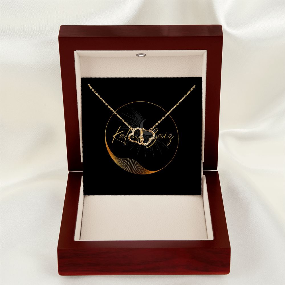 10K Yellow Gold Hearts Necklet A stunning, infinitely connected pair of 10K solid yellow gold hearts that perfectly symbolizes your Everlasting Love. Each heart is intricately accented with 18 pave set diamonds with a 0.07-carat weight, adding magnificent sparkle.
