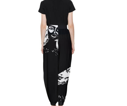 One of this season's statement pieces is the Monochrome Frida Leg Pants a modern of classic trousers, inspired in Frida Kahlo Made from a lightweight recycled nylon weave season's soft Seapray shade, the wide, high-waisted silhouette features allow you to style it with a plain leotard, or a classic shirt as your choose. Product Details Recycled Nylon Fabrication Main: 100% Recycled Nylon do not dry clean